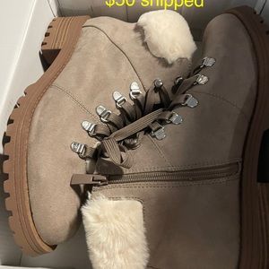 Torrid Boots. 10.5 wide. Very comfy. Band new in box.